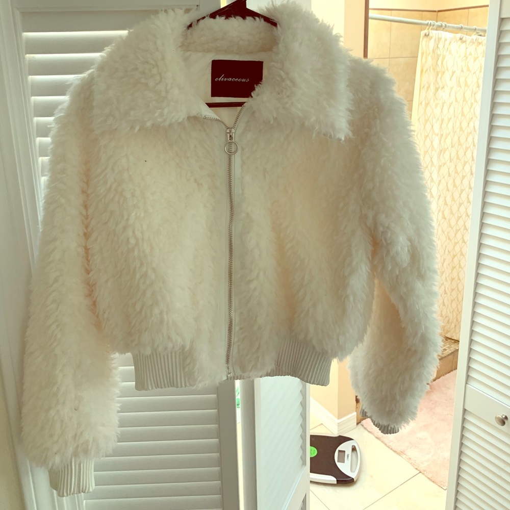 White faux fur coat